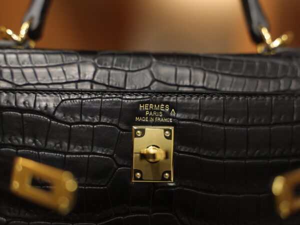 Kelly 25 Matte Porosus Black GHW