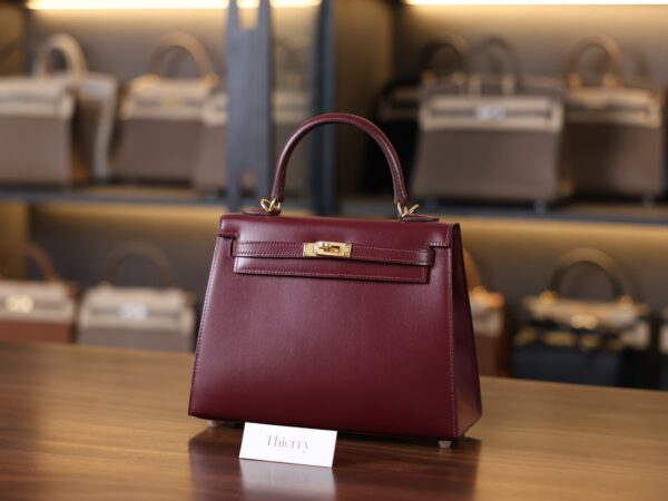 Kelly 25 Box Sellier Bordeaux GHW