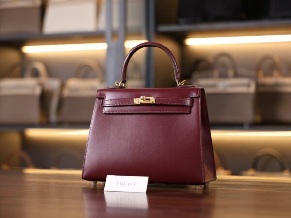 Kelly 25 Box Sellier Bordeaux GHW
