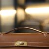 Kelly Pochette Swift Gold GHW